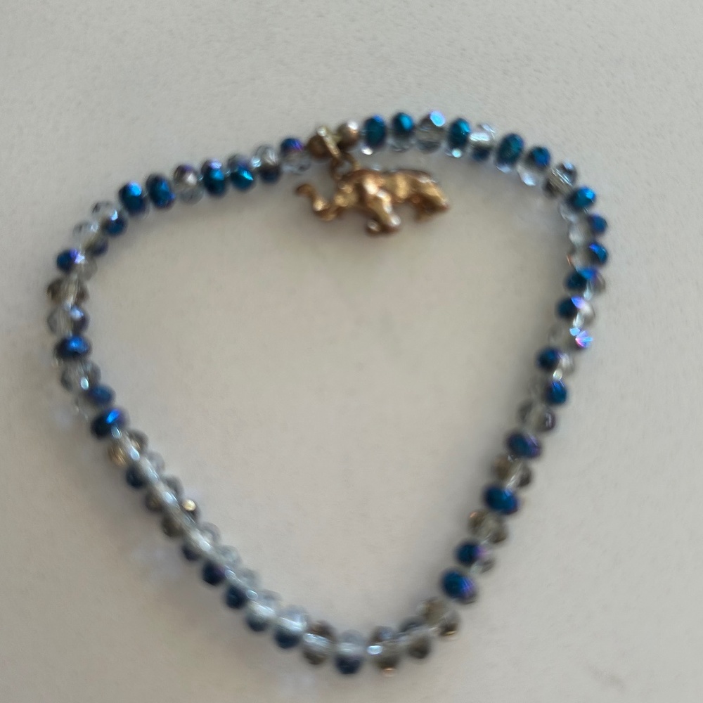 Beautiful Swarovski crystal stretch bracelet with elephant charm. 7"